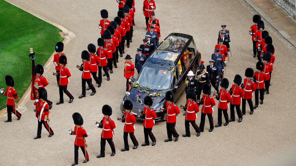 The hearse carrying the coffin of Britain's Queen Elizabeth drives at Windsor Castle on the day of the state funeral and her burial, in Windsor,