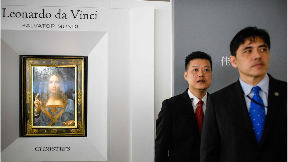 李振成（右）曾在香港知名拍賣行工作。