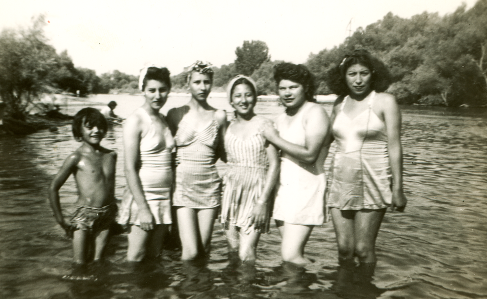 Young Mexican-Americans from San Bernardino bathe in the Santa Ana River due to restricted access to the municipal pool (mid-1930s).