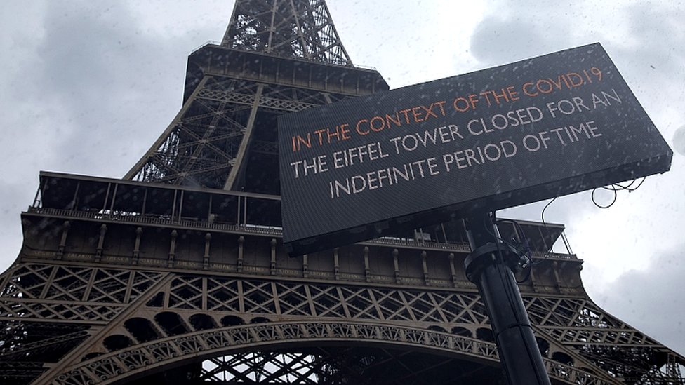 A sign notifies the closure of the Eiffel Tower. 14 March 2020