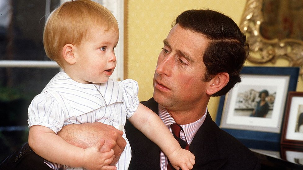 Prince Harry pictured aged one with his father, the Prince of Wales