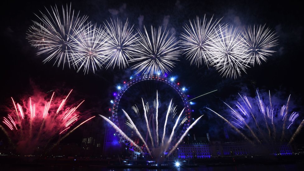 Fireworks explode over the London Eye