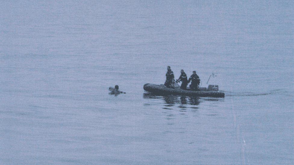 Мигрант в воде