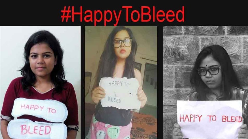 Женщины держат плакаты #HappyToBleed