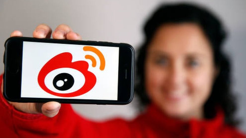 Chinese social media giant Weibo's shares fall in Hong Kong debut