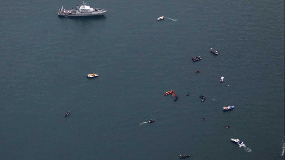 Ships pictured during a search for the Sriwijaya Air flight SJ-182 near Jakarta, Indonesia