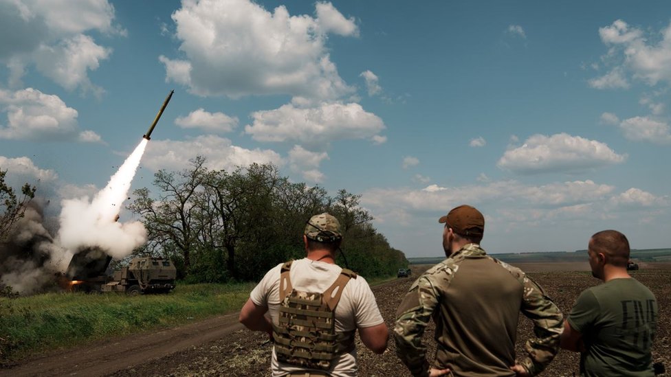Ukrainian militaries supervise as a M142 HIMARS launching a rocket on the Bakhmut direction