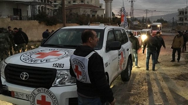 Red Cross working alongside the Syrian Arab Red Crescent (SARC) and the United Nations (UN), shows a convoy containing food, medical items, blankets and other materials being delivered to the town of Madaya