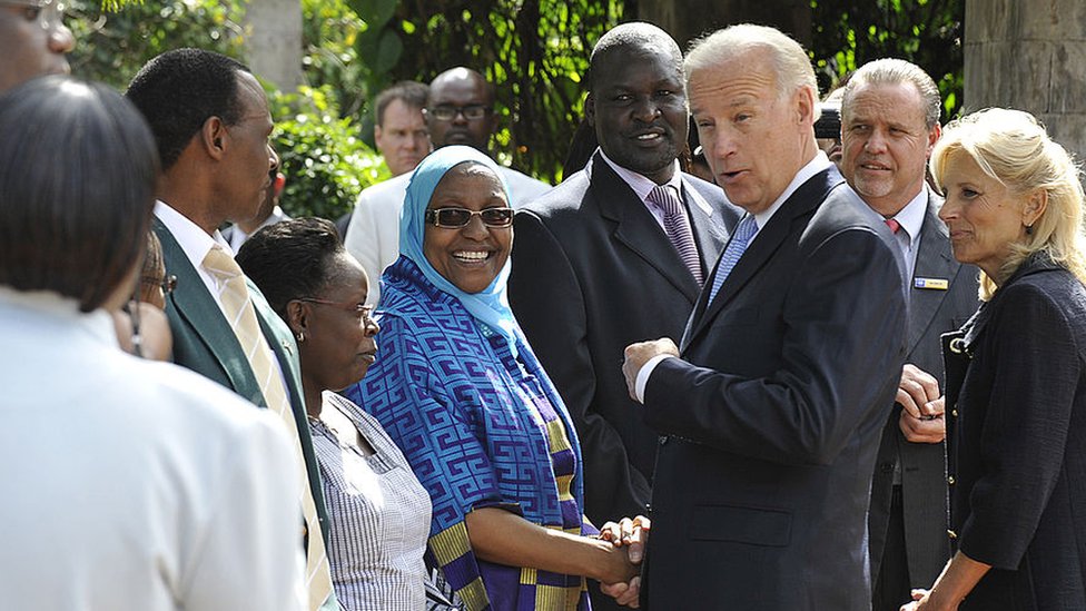 Joe Biden talk to employees and survivors of former US embassy in Nairobi on a visit to Kenya in June 2010