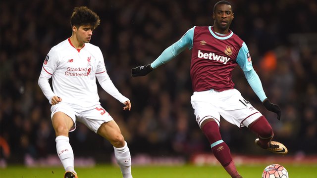 Joao Carlos Teixeira of Liverpool watches West Ham's Pedro Mba Obiang