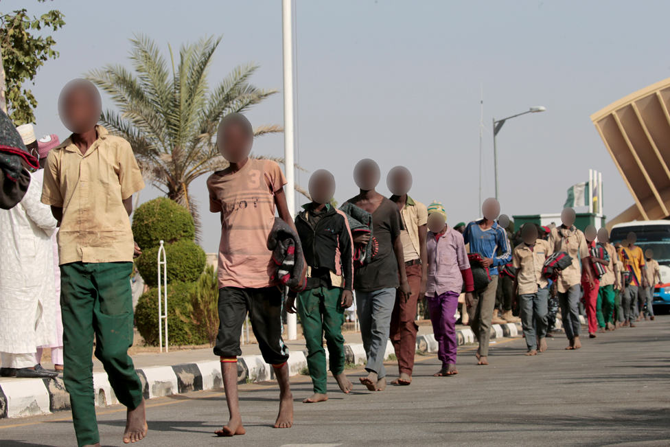 Freed Nigerian schoolboys walk after they were rescued by security forces in Katsina, Nigeria, December 18, 2020. REUTERS/Afolabi Sotunde