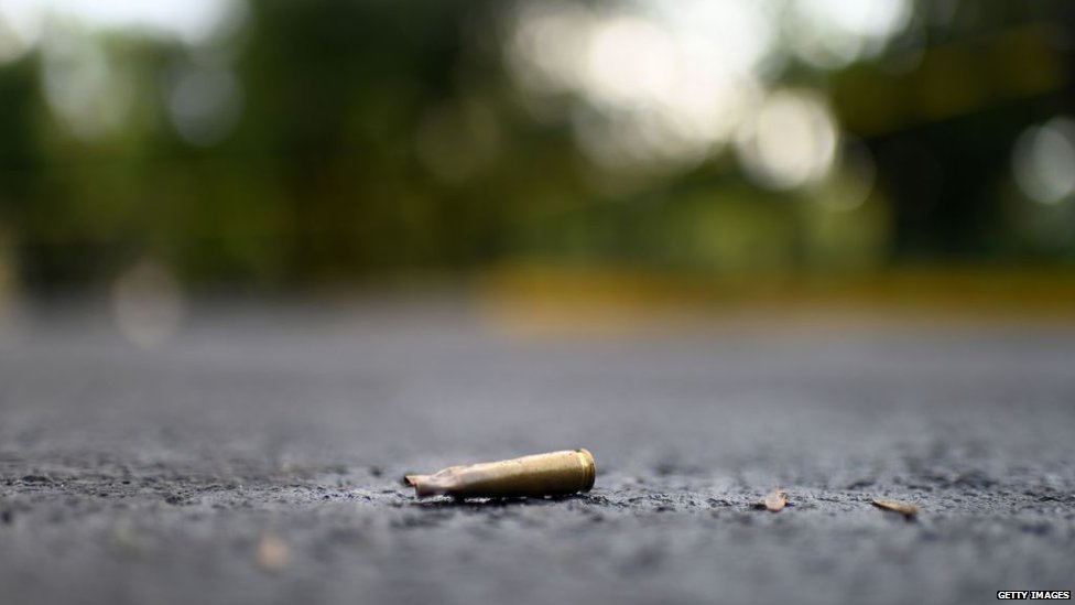 A bullet leftover after a group of men, some dressed as roadworkers, opened fire in an upscale neighbourhood