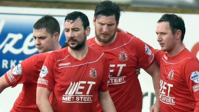 Portadown players celebrate victory over Coleraine in the Irish Cup