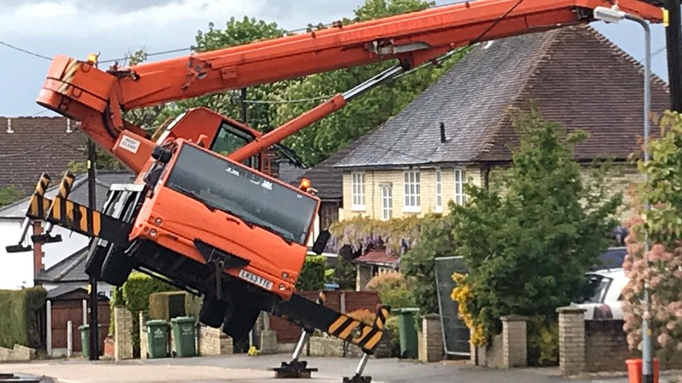 Crane falls on house roof in Billericay BBC News