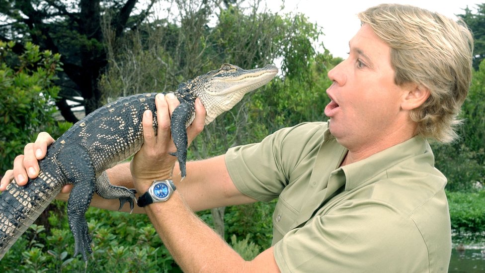 Steve Irwin with a baby crocodile