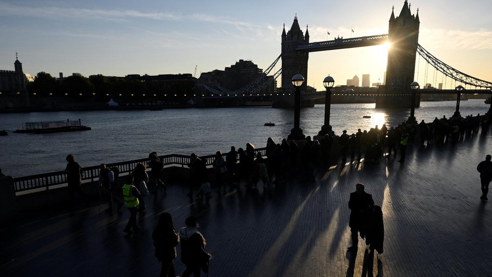 People queue near Tower Bridge, to pay their respects to the Queen