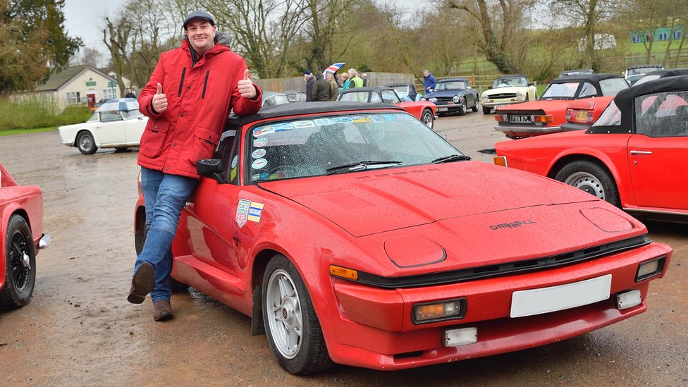 Wayne Scott with his red Triumph TR8