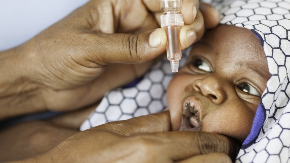 African baby being immunised
