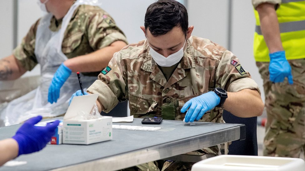 FILE PHOTO: Soldiers work at The Exhibition Centre, which has been set up as a testing centre as part of the mass coronavirus disease