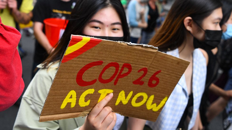 在墨爾本舉行的全球氣候變化行動日期間，人們參加抗議集會