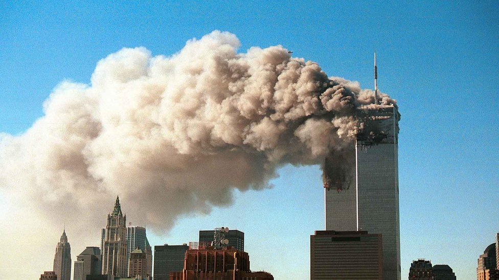 Smoke plumes from the twin towers of New York's World Trade Center, shortly after the attack on 11 September 2001`