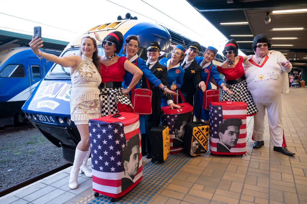 Elvis tribute artists arrive at Central station, Sydney, Australia ahead of boarding the Elvis Express to Parkes for the annual festival - 21 April, 2022.