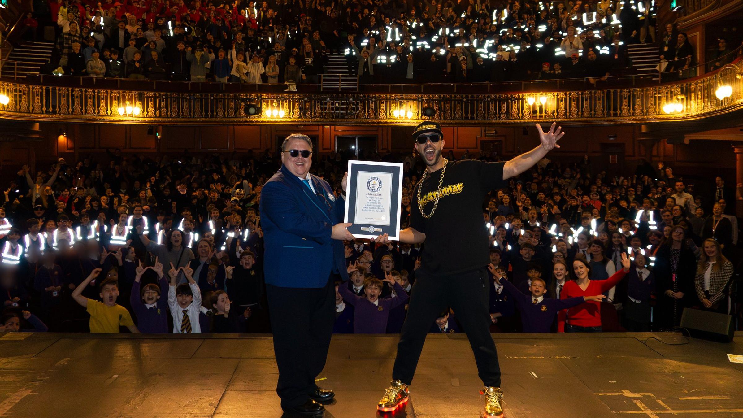 MC Grammar breaks record for largest rap lesson - BBC News