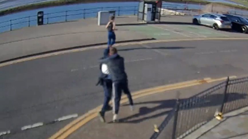 Teen beach killers hug in street as they flee the scene