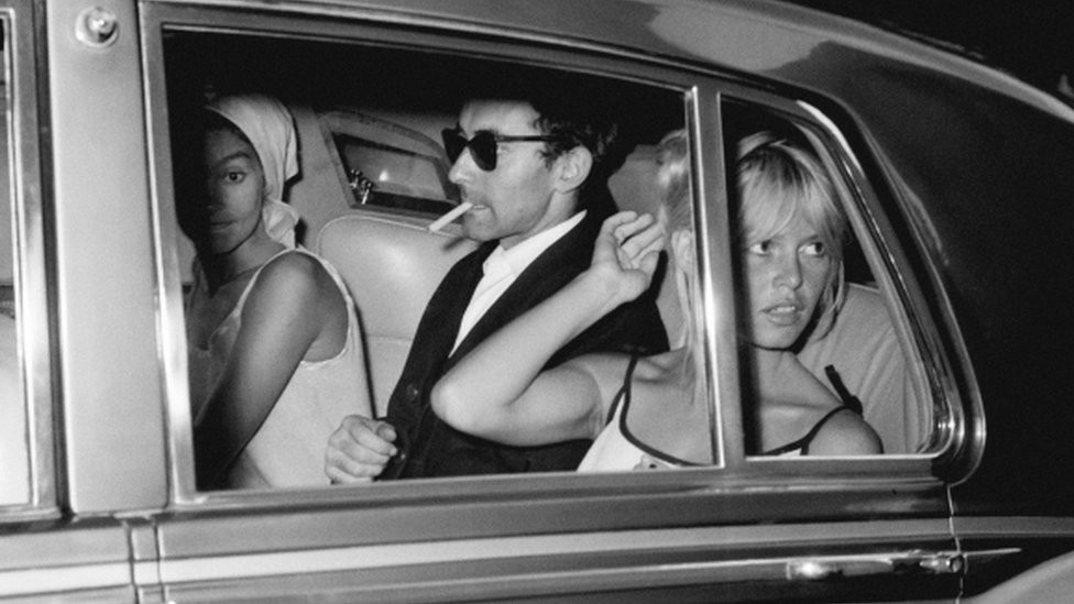 Jean-Luc Godard and Brigitte Bardot in a car