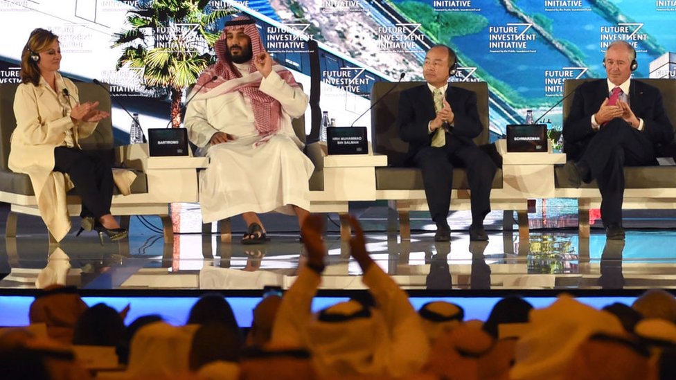 Saudi Crown Prince Mohammed bin Salman (2ND L), US journalist Maria Bartiromo (L), Masayoshi Son (3RD L), the Chief Executive Officer of SoftBank and Stephen Shwarzman, CEO of the Blackstone Group, attend the Future Investment Initiative (FII) conference in Riyadh, on 24 October 2017