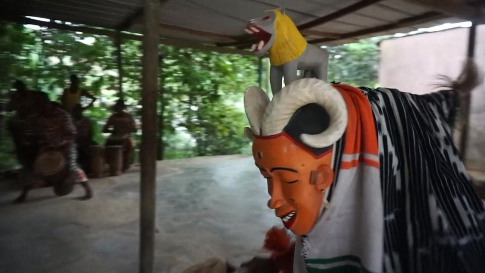 Masked dancer in Ivory Coast