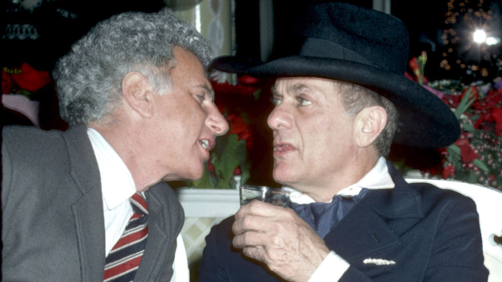 Mark Fleischman (left) with actor Tony Curtis in 1983