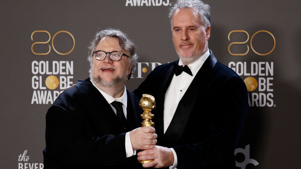 Del Toro y Mark Gustafson