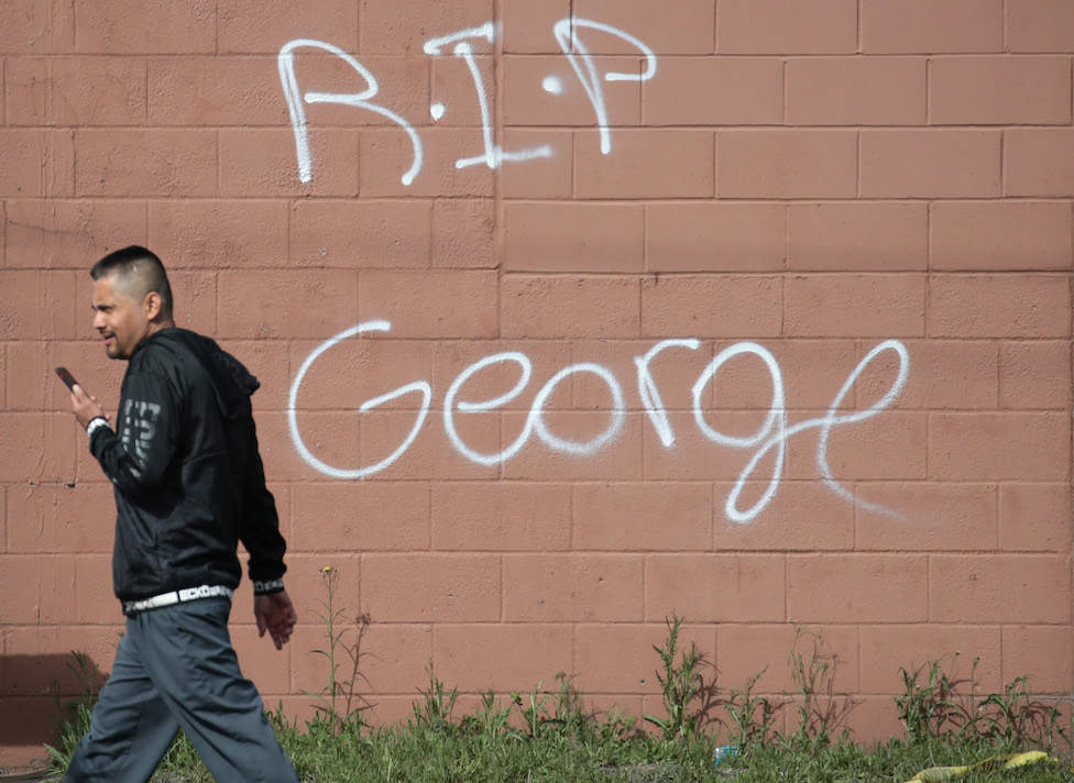 A wall is spray-painted RIP George