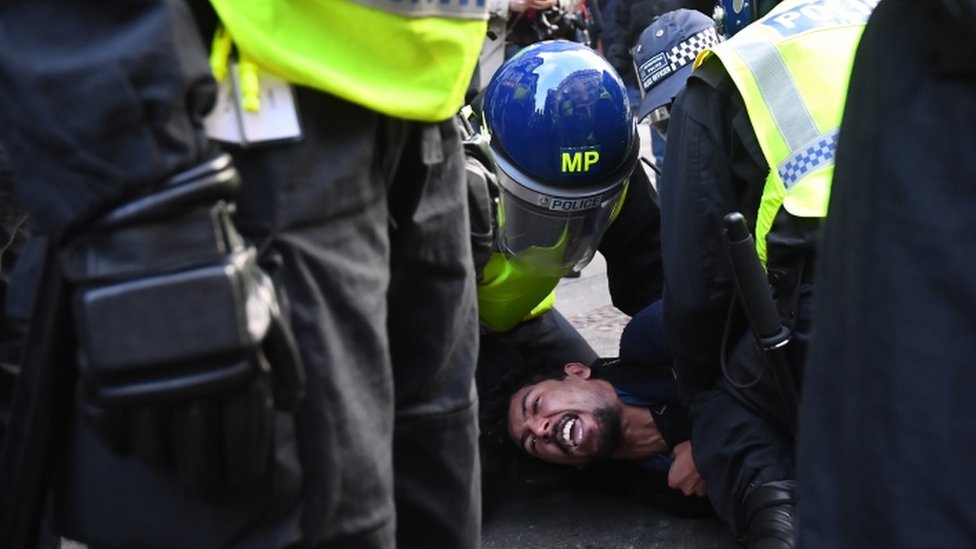 Protester being arrested