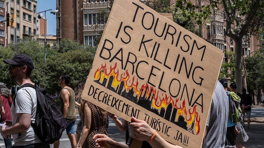 Spain tourism: The protesters and residents pushing back on tourism in  Barcelona