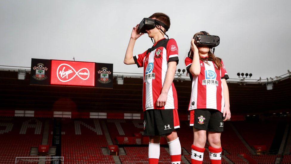 Young Southampton FC fans given headsets to help vision - BBC News