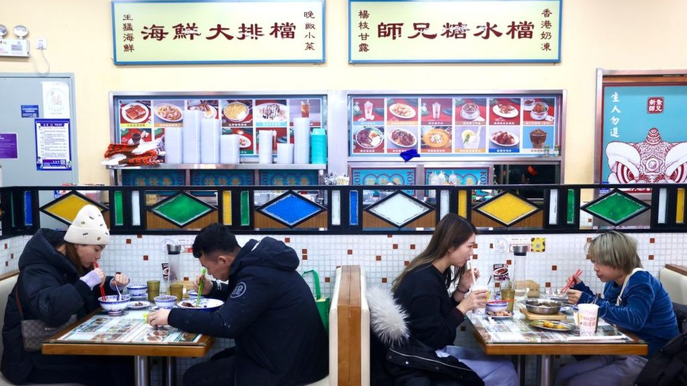 Customers dine at a restaurant as Beijing no longer requires people to show their negative nucleic acid testing results before entering public places on December 21, 2022