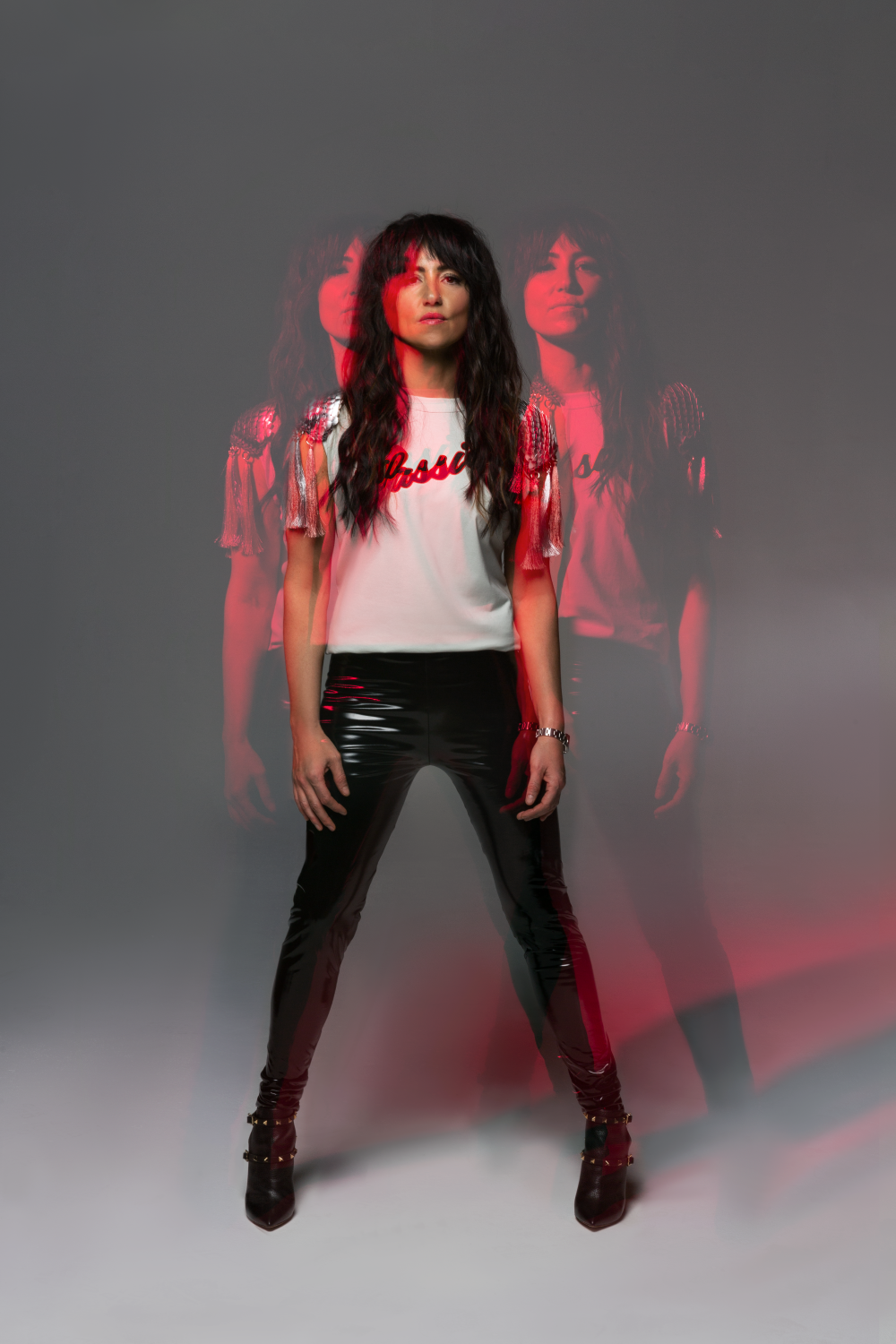 Popstar KT Tunstall in a wide-legged pose.
