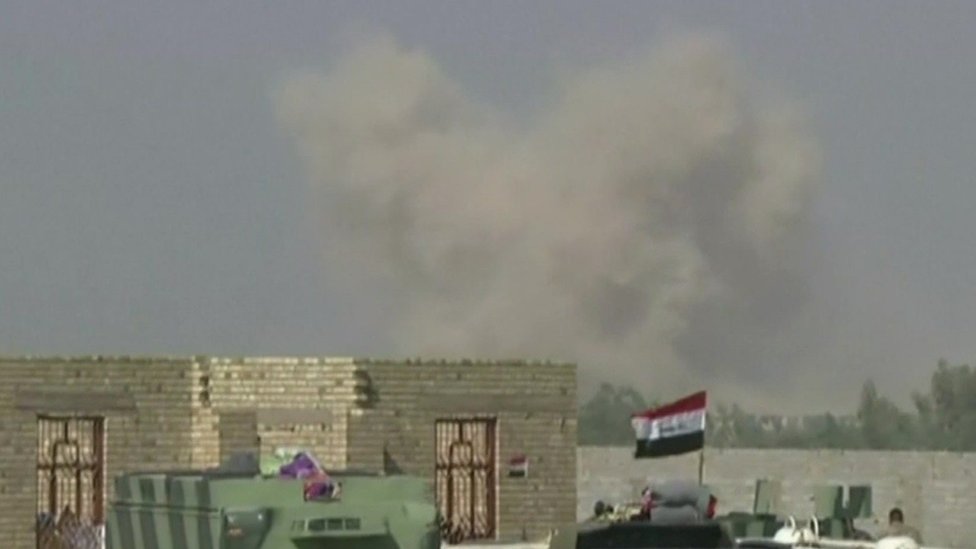Smoke rises from Falluja