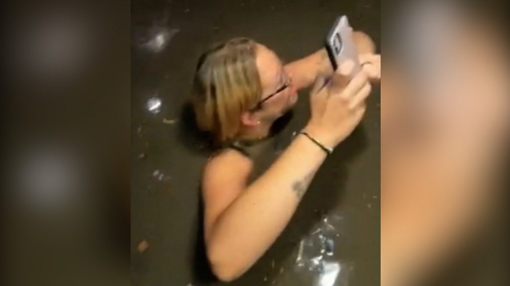 Friends narrowly escape flooding elevator