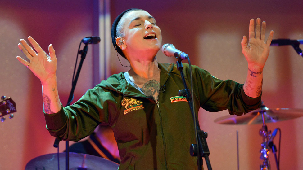Sinead O'Connor on stage in 2013