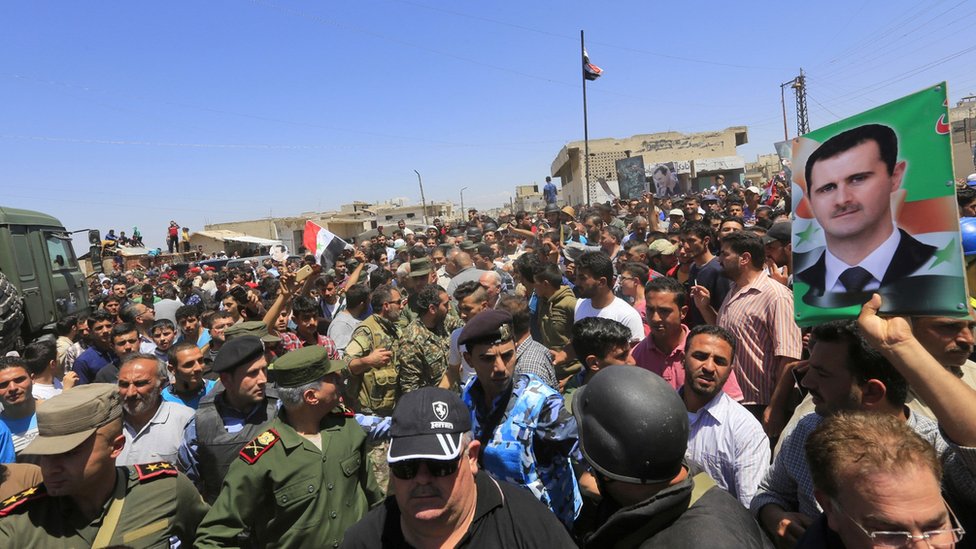 Силы сирийского правительства входят в город Растан после эвакуации повстанцев (16 мая 2018 г.)