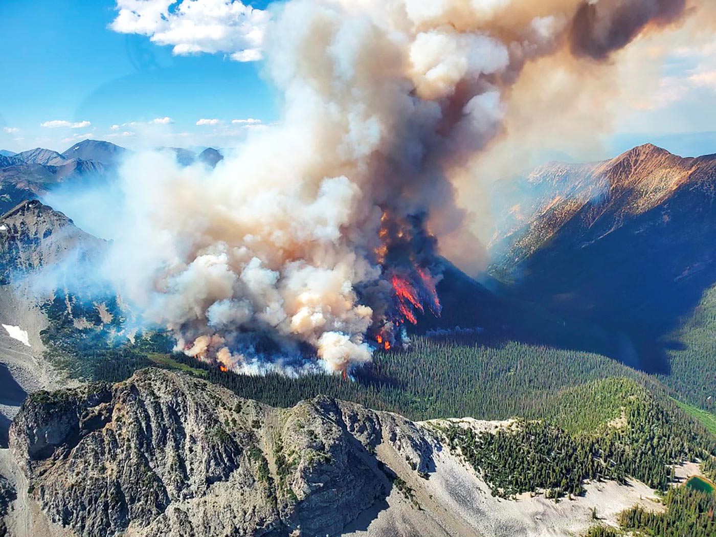 Smoke rises from the Texas Creek wildfire, south of Lillooet, British Columbia, Canada - 9 July 2023
