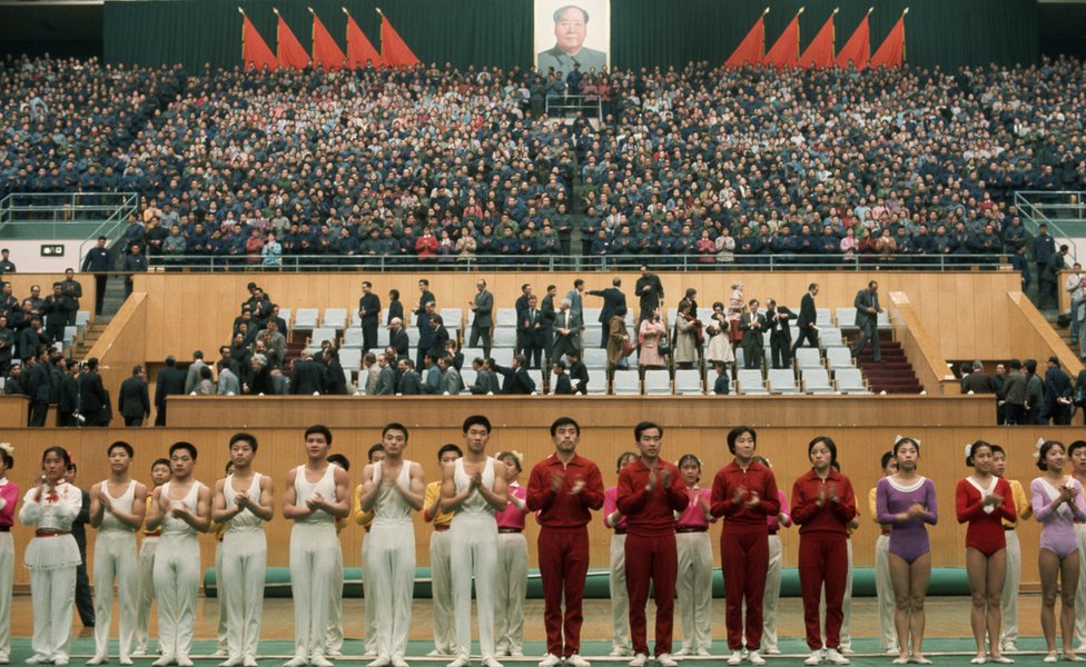 Chinese gymnasts stand in formation after having performed for visiting US President Richard Nixon.