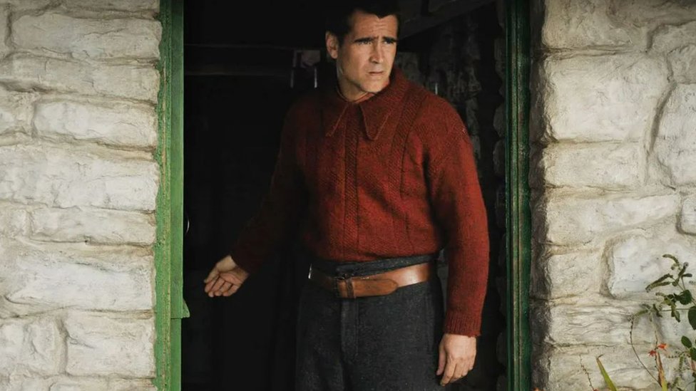 Colin Farrell wearing the red jumper