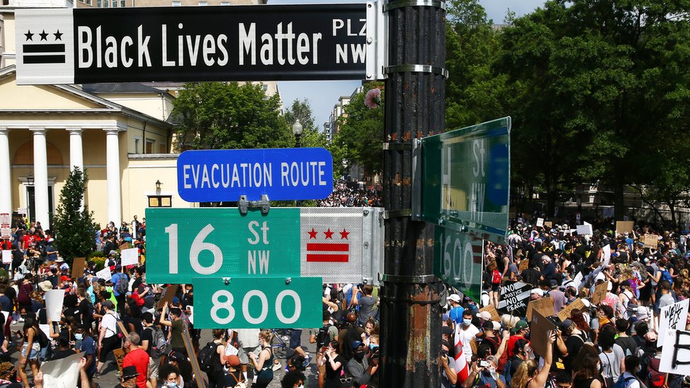 Protesters gather on the newly named Black Lives Matter Plaza in Washington DC (6 June 2020)