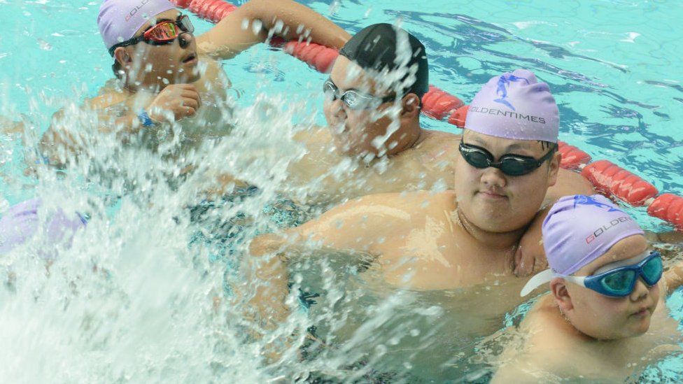  Obese students in a summer camp losing weight in Zhengzhou, China 