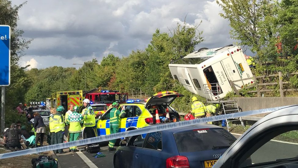 M25 coach crash Dozens injured three seriously