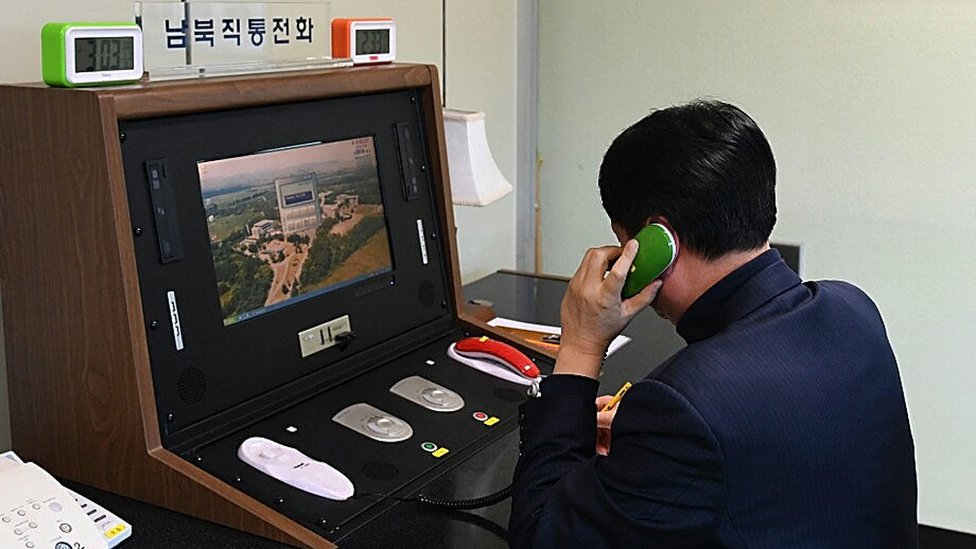 Фотография Южной Кореи, говорящей с Севером